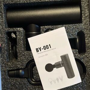 Massage Vibration Percussion Device. New in box.